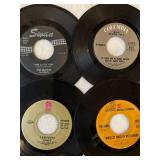45 rpm records featuring Beatles, Blue Oyster Cult, Ojays, Kinks and more