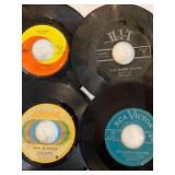45 rpm records with a country flair featuring Glen Campbell, Hank Snow, Jim Reeves, Merle Haggard and more