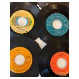 45 rpm records with a country flair featuring Glen Campbell, Hank Snow, Jim Reeves, Merle Haggard and more