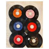 45 rpm records with a country flair featuring Marty Robbins, Kitty Wells, Little Jimmy Dickens, Highway Men and more