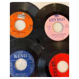 45 rpm records with a country flair featuring Marty Robbins, Kitty Wells, Little Jimmy Dickens, Highway Men and more