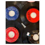 45 rpm records with a country flair featuring Marty Robbins, Kitty Wells, Little Jimmy Dickens, Highway Men and more