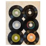 45 rpm records featuring Bread, Barry Manilow, 5th Dimension, Duran Duran, Bee Gees, and Steamroller