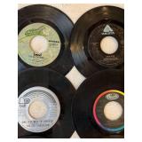45 rpm records featuring Bread, Barry Manilow, 5th Dimension, Duran Duran, Bee Gees, and Steamroller
