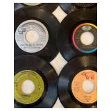 45 rpm records featuring Bread, Barry Manilow, 5th Dimension, Duran Duran, Bee Gees, and Steamroller