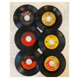 45 rpm records featuring Beatles, Abba, Hollies, Wilson Pickett, Herb Albert, and Boxtops