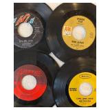 45 rpm records featuring Beatles, Abba, Hollies, Wilson Pickett, Herb Albert, and Boxtops