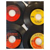 45 rpm records featuring Beatles, Abba, Hollies, Wilson Pickett, Herb Albert, and Boxtops
