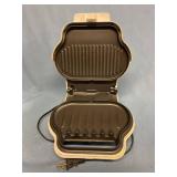 Small George Foreman grilling machine