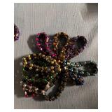 50 attractive bracelets with hematite-looking stones and colored beads