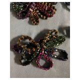 50 attractive bracelets with hematite-looking stones and colored beads