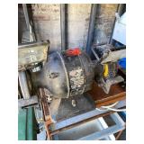 Grinder and vise on table