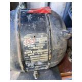 Grinder and vise on table