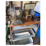 Grinder and vise on table