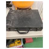 Metal case full of clamps