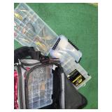 Fishing tackle carry bag with tackle