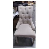 tan tuffed fabric seating chair