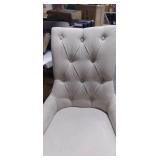 tan tuffed fabric seating chair