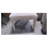 tan tuffed fabric seating chair
