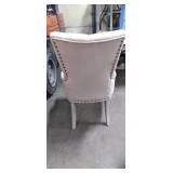 tan tuffed fabric seating chair