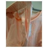 size large peach long sleeved sleep shirt and shorts set