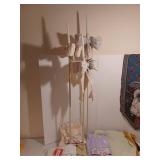 Fur pelts, tall wooden candle holder, cat table runner