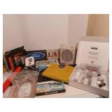 License plates, blood pressure monitor, scale, fan, magnifying glass