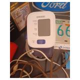 License plates, blood pressure monitor, scale, fan, magnifying glass