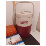 Lil Oscar cooler, lightbulbs, toolbox and Coleman water jug