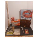 Jumper cables, dent remover tool, strap wrench, locks