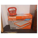 Jumper cables, dent remover tool, strap wrench, locks