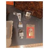 Jumper cables, dent remover tool, strap wrench, locks