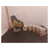 Butterfly coffee cups and solar powered light