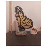 Butterfly coffee cups and solar powered light