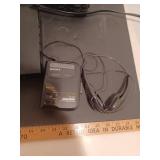 Miniature stereos, DVD player, and Walkman, camera film