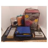 Sleeping bag NIB, poncho, battery charger, umbrella, lunch tote