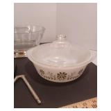 Covered baking dish, tea kettle, cross, wine opener and thimbles