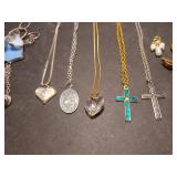Religious jewelry, crosses and angels