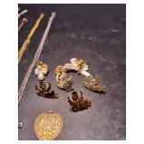 Religious jewelry, crosses and angels