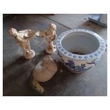 Large blue planter, cat stone and cherub bird baths