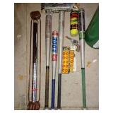 Bats, tennis balls, foot pump and cap gun