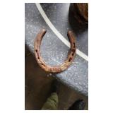 Small Bucket of Horse Shoes