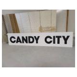Candy City Sign Black Lettering White Background