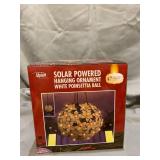 Alpine Corporation Solar Hanging Poinsettia Ornament with LED Light