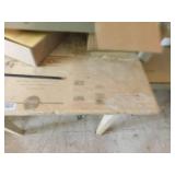 wood table - old news print on top