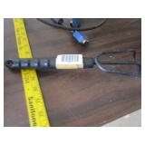 Printer cable and garden trowel