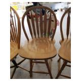 Unmatched swivel bar chairs