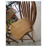 Unmatched swivel bar chairs