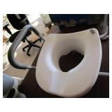 Toilet riser with handles