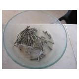 Glass bowl with miscellaneous items